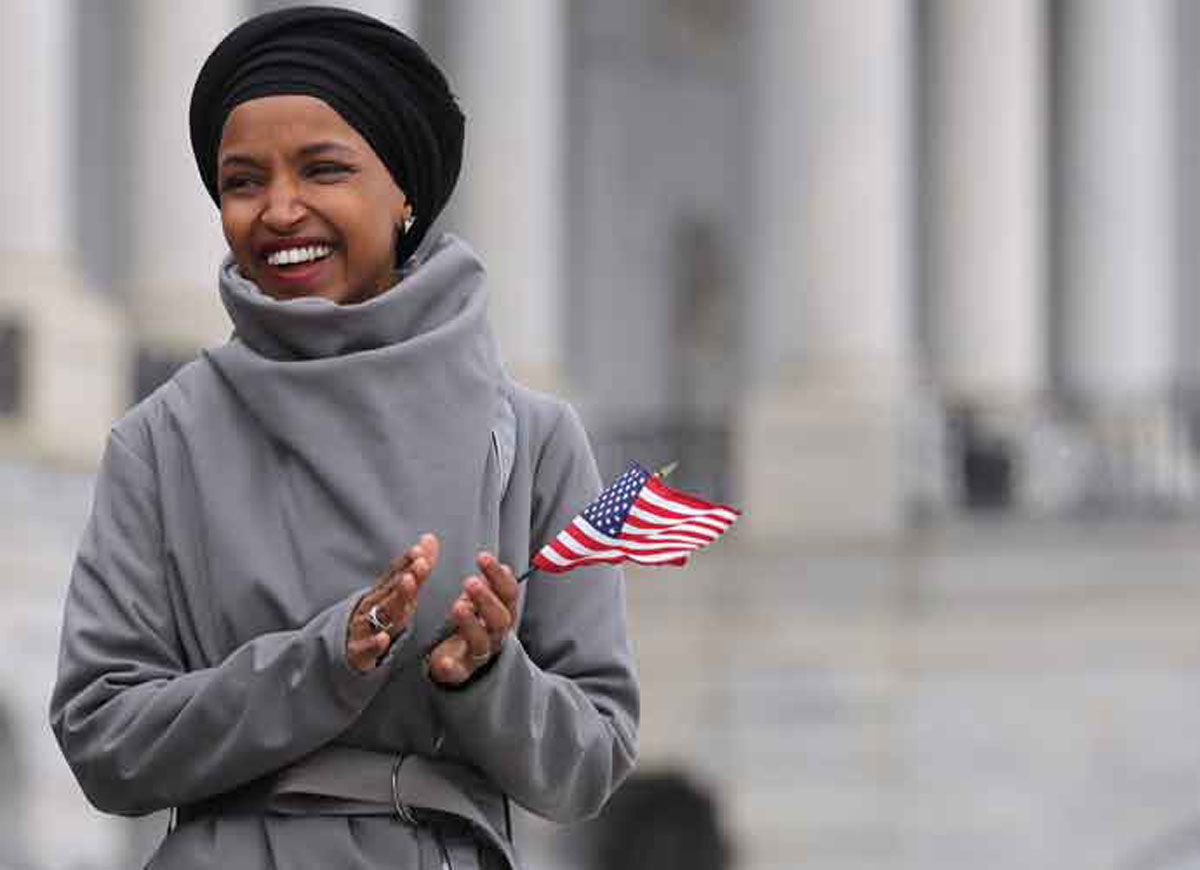WASHINGTON, DC - MARCH 08: Rep. Ilhan Omar (D-MN) rallies with fellow Democrats before voting on H.R. 1, or the People Act, on the East Steps of the U.S. Capitol March 08, 2019 in Washington, DC. With almost zero chance of passing the Senate, H.R. 1 is a package of legislation aimed at bolstering voting rights, reducing corruption in Washington and overhauling the campaign finance system in an effort to reduce the influence of