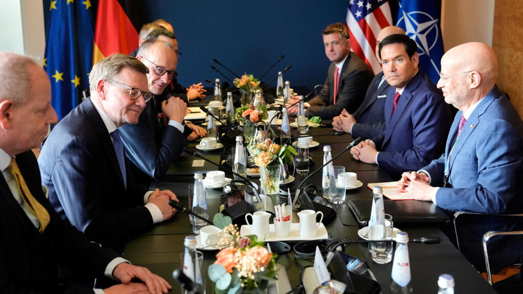 U.S. Secretary of State Marco Rubio and Germany's Chancellor Friedrich Merz meet in Munich, Germany February 13, 2026 during the Munich Security Conference. 
