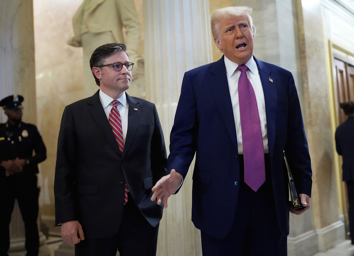 WASHINGTON, DC - MAY 20: President Donald Trump arrives with Speaker of the House Mike Johnson (R-LA) for a House Republican meeting at the U.S. Capitol on May 20, 2025 in Washington, DC. Trump will join conservative House lawmakers to help push through their budget bill after it advanced through the House Budget Committee on Sunday evening. (Photo by Kevin Dietsch/Getty Images)