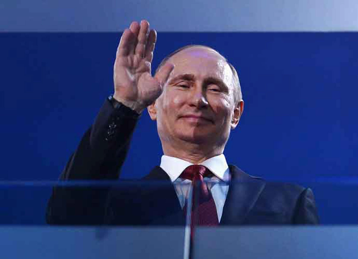 SOCHI, RUSSIA - MARCH 16: Russia President Vladimir Putin waves during the Sochi 2014 Paralympic Winter Games Closing Ceremony at Fisht Olympic Stadium on March 16, 2014 in Sochi, Russia. (Photo by Dennis Grombkowski/Getty Images)