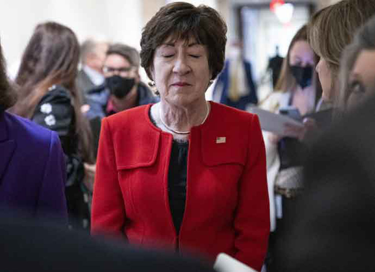 Senator Susan Collins, a Republican from Maine, pauses for a moment upon arrival to a news conference on the bipartisan modernized Violence Against Women Act (VAWA) at the U.S. Capitol in Washington, D.C., U.S., on Wednesday, Feb. 9, 2022. The legislation around the reauthorization of the VAWA includes new funding, housing protections for survivors of domestic abuse and closing loopholes in previously passed firearm legislation. Photographer: Sarah Silbiger/Bloomberg via Getty Images