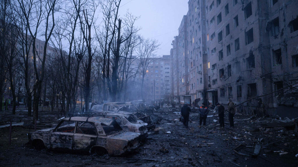 Damaged cars are seen in the courtyard of a residential neighbourhood following Russia's airstrike in Kramatorsk, Donetsk region, on February 8, 2026.