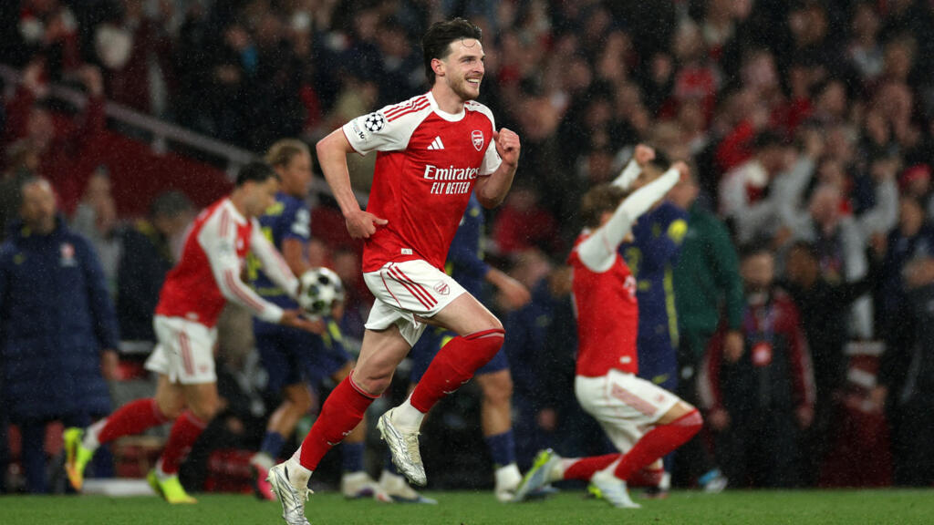 Arsenal's English midfielder #41 Declan Rice celebrates winning the UEFA Champions League second-leg semi-final football match between Arsenal and Atletico Madrid at the Emirates Stadium in north Lond
