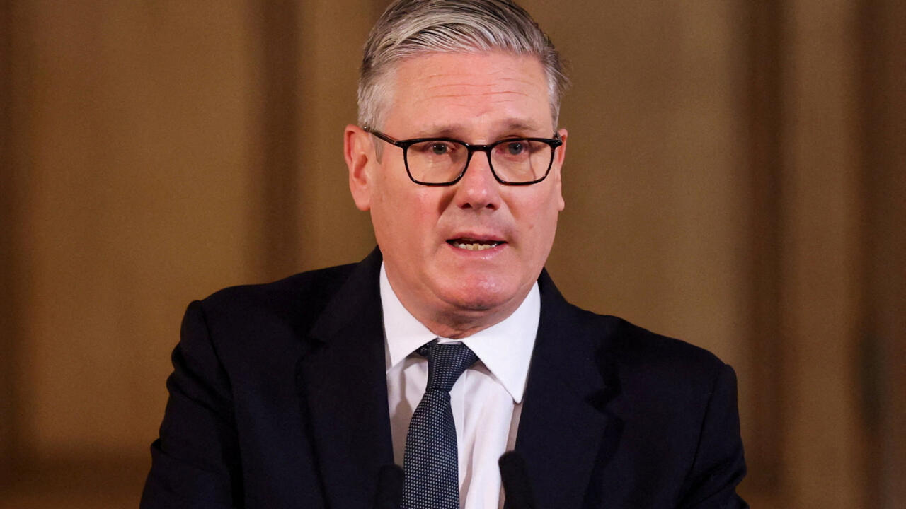 Members of the media gather at Downing Street in London on May 11, 2026 as rumours swirl that Prime Minister Keir Starmer may soon resign