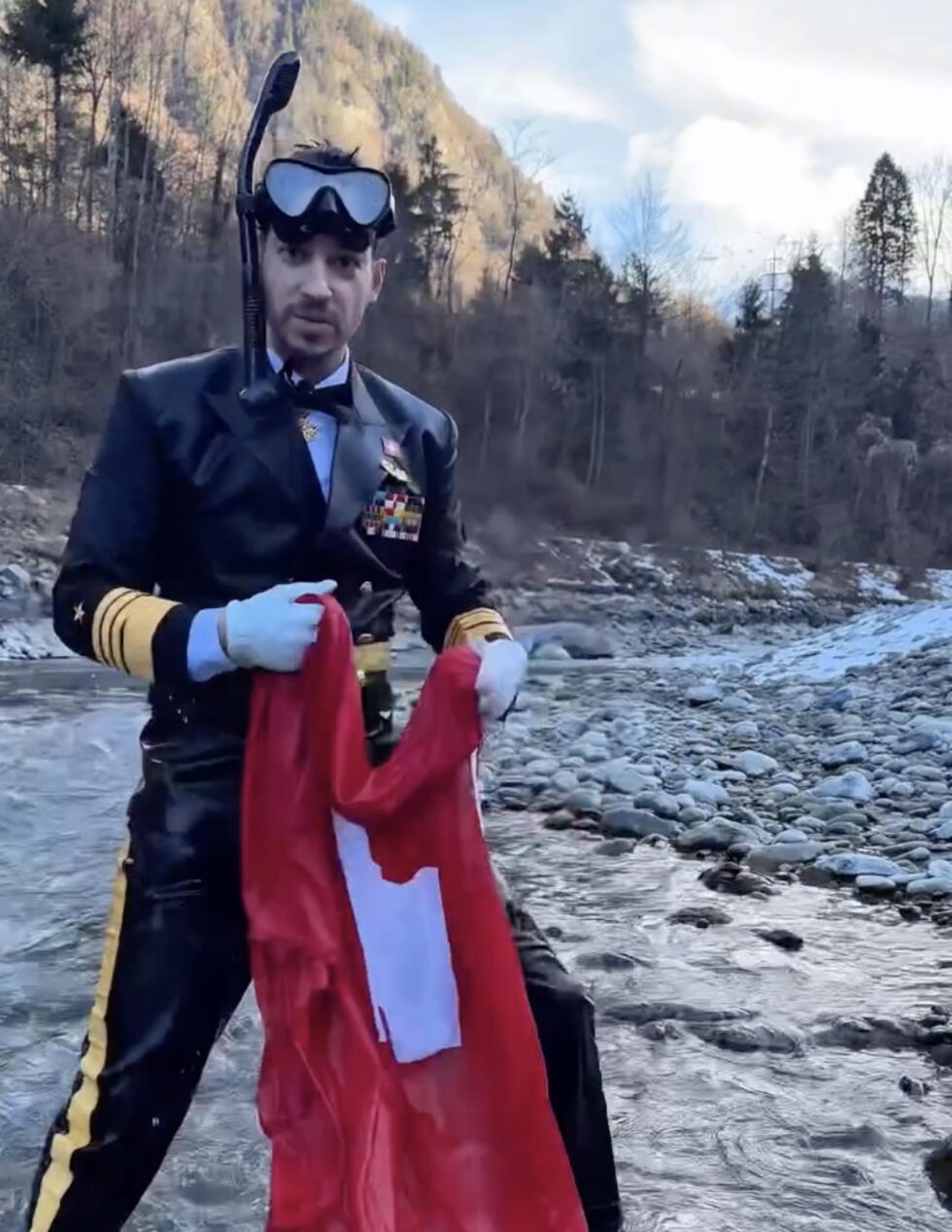 Lauwiner ran in Bern's canton elections in March 2026. This campaign video shows him in royal garb, standing in a stream