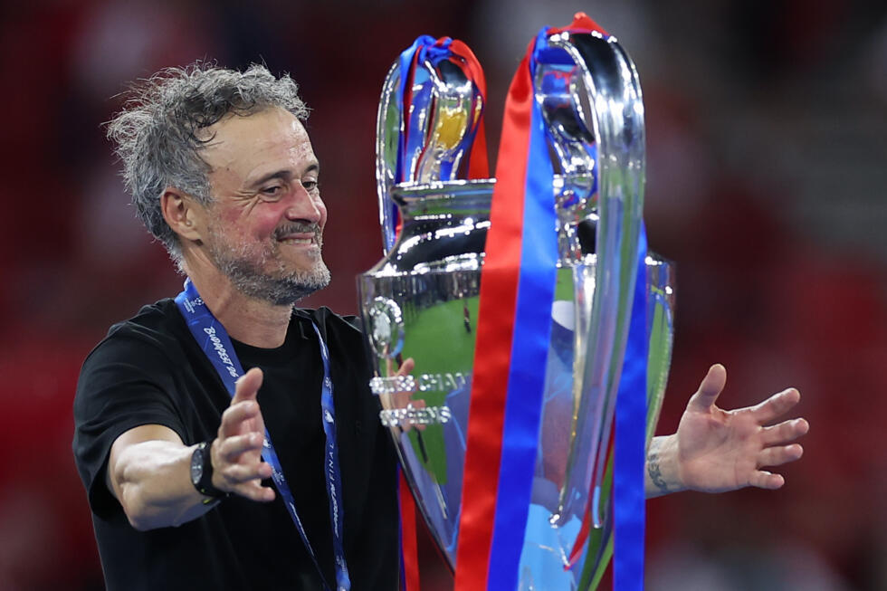 PSG head coach Luis Enrique celebrates after the Champions League final football match between against Arsenal in Budapest, Hungary, Saturday, May 30, 2026.
