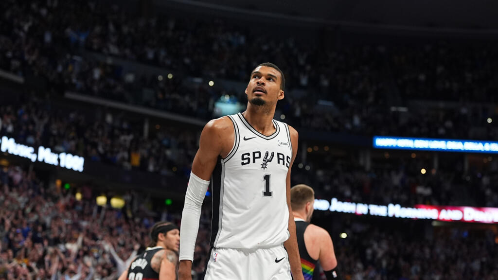 San Antonio Spurs center Victor Wembanyama (1) in overtime of an NBA basketball game Saturday, April 4, 2026, in Denver. 