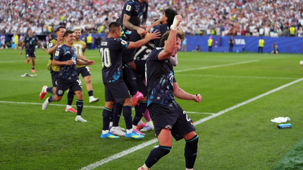 Paraguay's Matias Galarza celebrates after winning the World Cup round of 32 soccer match between Germany and Paraguay in Foxborough, Massachusetts, Monday, June 29
