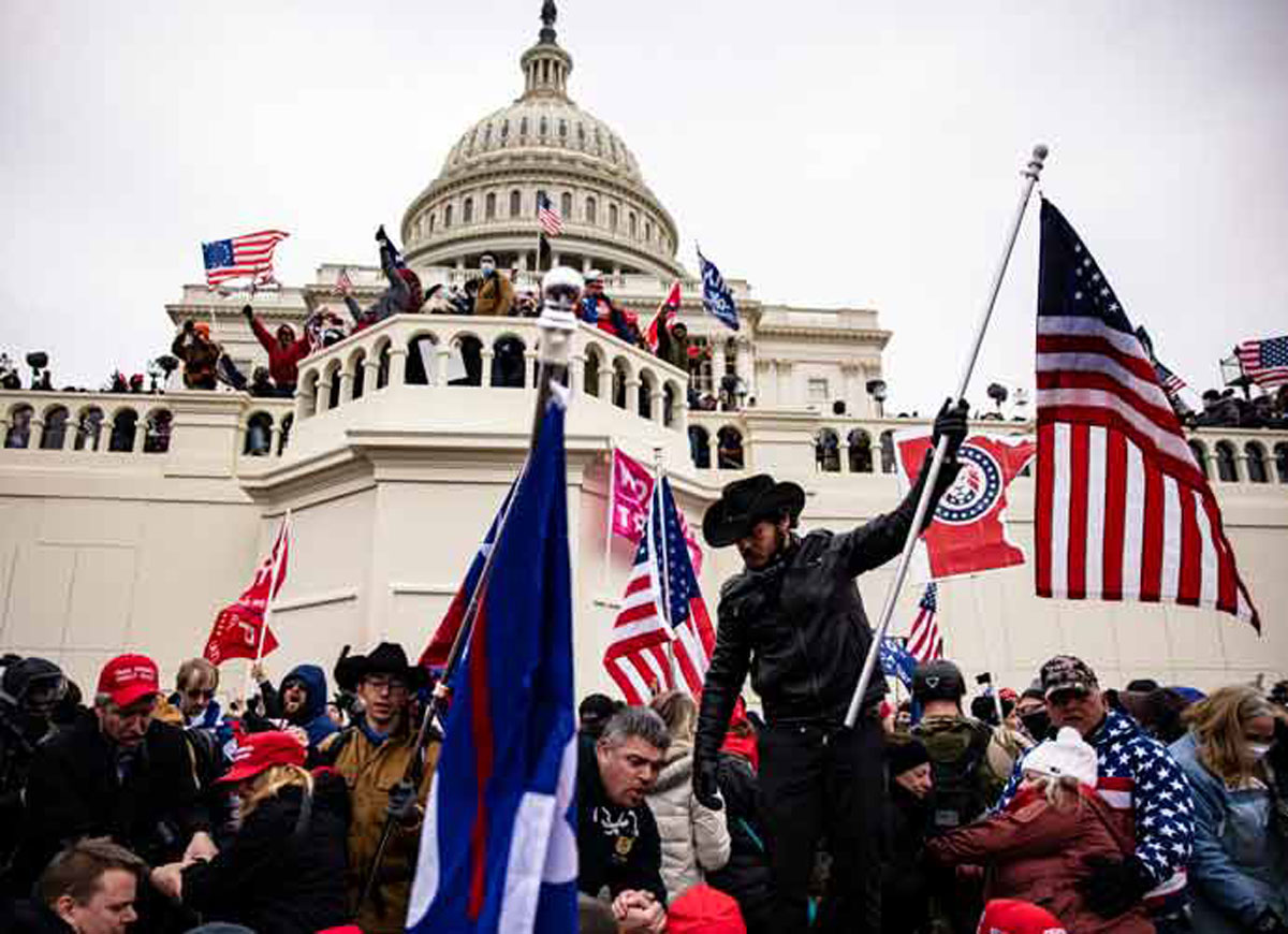 WASHINGTON, DC - JANUARY 06: Pro-Trump supporters storm the U.S. Capitol following a rally with President Donald Trump on January 6, 2021 in Washington, DC. Trump supporters gathered in the nation