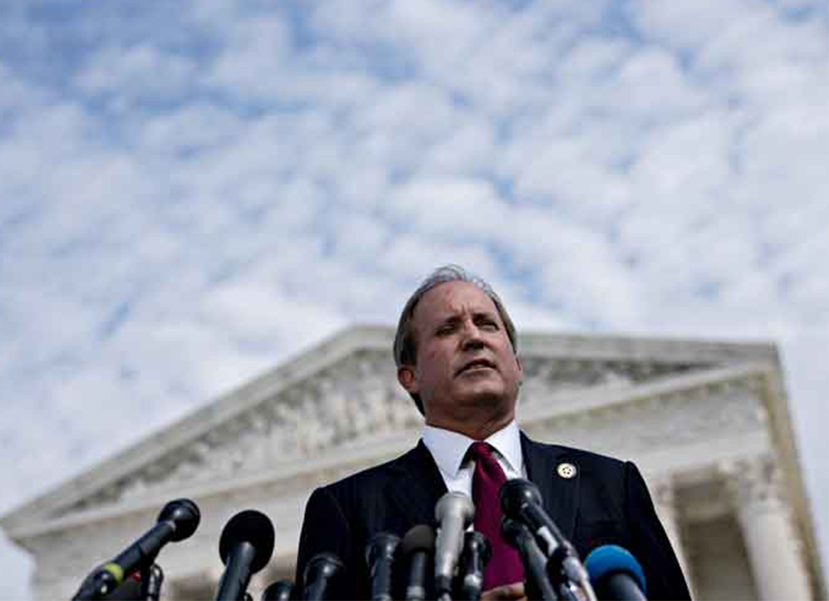 Ken Paxton, Texas attorney general, speaks during a news conference outside the Supreme Court in Washington, D.C., U.S., on Monday, Sept. 9, 2019. A group of 50 attorneys general opened a broad investigation into whether advertising practices of Alphabet Inc.