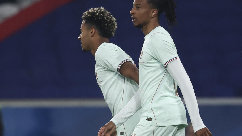 France's forward #11 Michael Olise celebrates scoring his team's second goal with France's forward #20 Desire Doue (L) during the international friendly football match between France and North Ireland at the Decathlon Arena - Pierre Mauroy stadium in Villeneuve-d'Ascq, northern France on June 8, 2026.