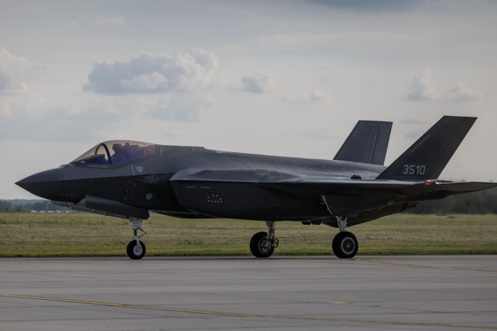 One of the first of three US-made F-35 aircraft in Polish Air Force colours taxis along the runway at the 32nd Tactical Air Base in Lask, central Poland, on May 22, 2026