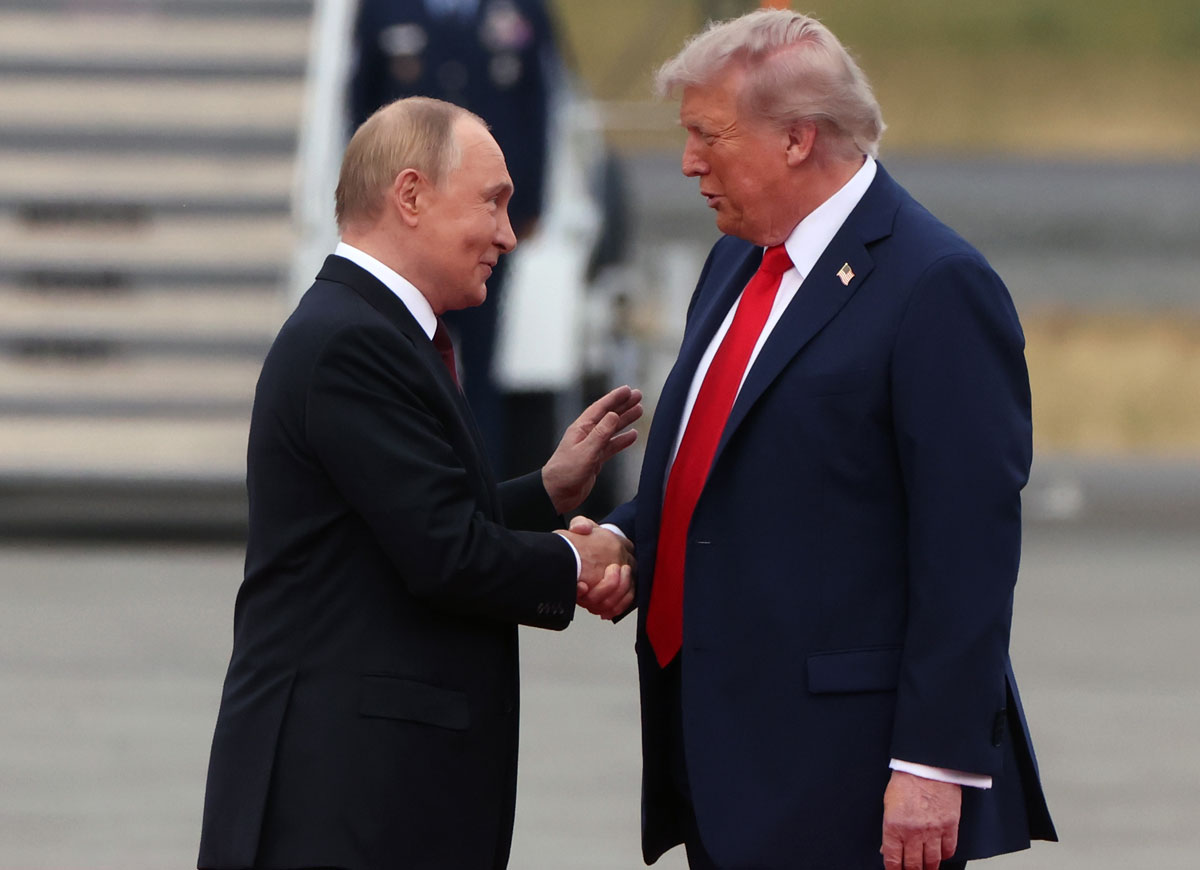 ANCHORAGE, ALASKA - AUGUST 15: U.S. President Donald Trump welcomes Russian President Vladimir Putin to Joint Base Elmendorf-Richardson on August 15, 2025 in Anchorage, Alaska. The two leaders are meeting for peace talks aimed at ending the war in Ukraine. (Photo by Contributor/Getty Images)