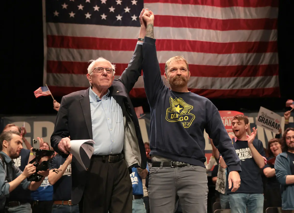 ORONO, MAINE - MAY 24: Sen. Bernie Sanders (I-VT) and Democratic U.S. Senate candidate Graham Platner stand together during a “Fighting Oligarchy” tour stop at the Collins Center for the Arts on the University of Maine campus on May 24, 2026 in Orono, Maine. Platner is the presumptive Democratic nominee and will face incumbent Sen. Susan Collins (R-ME) for Maine