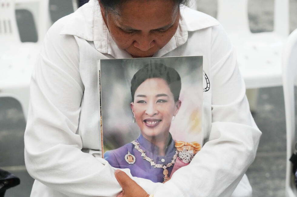 A person holds a photo of the late Thai princess Bajrakitiyabha Mahidol in Bangkok, Thailand, on June 12, 2026