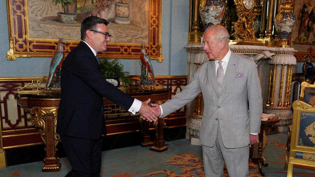 King Charles III welcomes Andy Burnham during an audience at Buckingham Palace, London