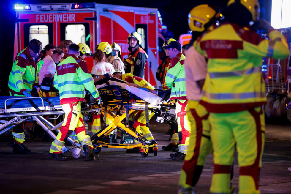 Emergency responders work on the site of the Berlin Pride attack on Saturday night, July 25, 2026.
