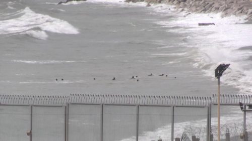 Hundreds of migrants enter Spain’s north African territory Ceuta from Morocco