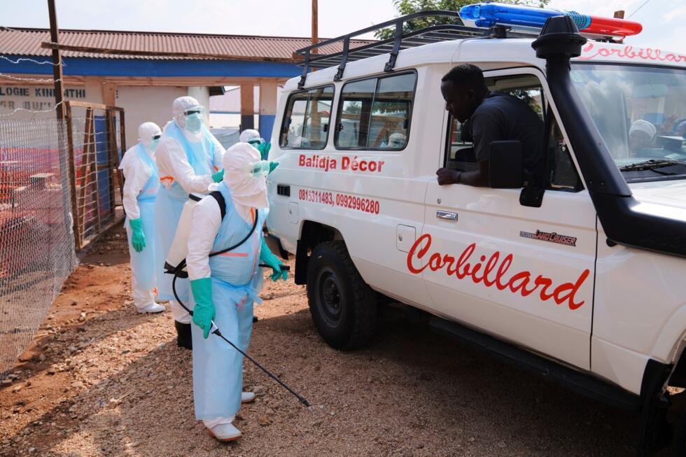 Health workers disinfects an ambulance at Ebola Treatment Center at Bunia General Hospital in Ituri, Congo, on Wednesday, July 22, 2026.