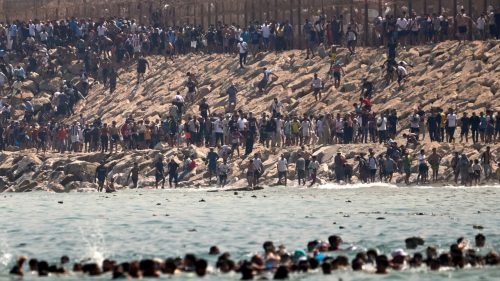 ‘It took me two hours’: 40,000 migrants swim from Morocco into Spain’s Ceuta
