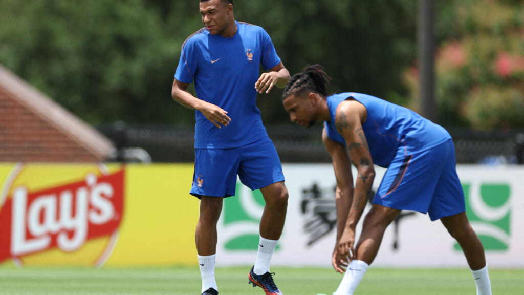 France's forward #10 Kylian Mbappé and forward #11 Michael Olise take part in an MD-1 training session at the Southern Methodist University (SMU) in University Park, Texas on July 13, 2026