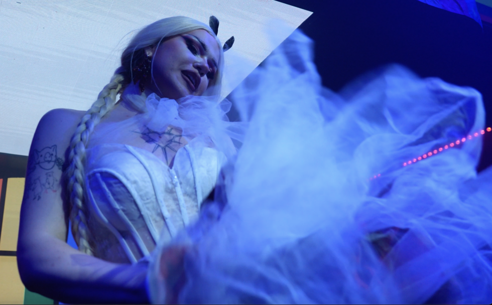 Molly as Molly Tok performing in Yerevan, Armenia
