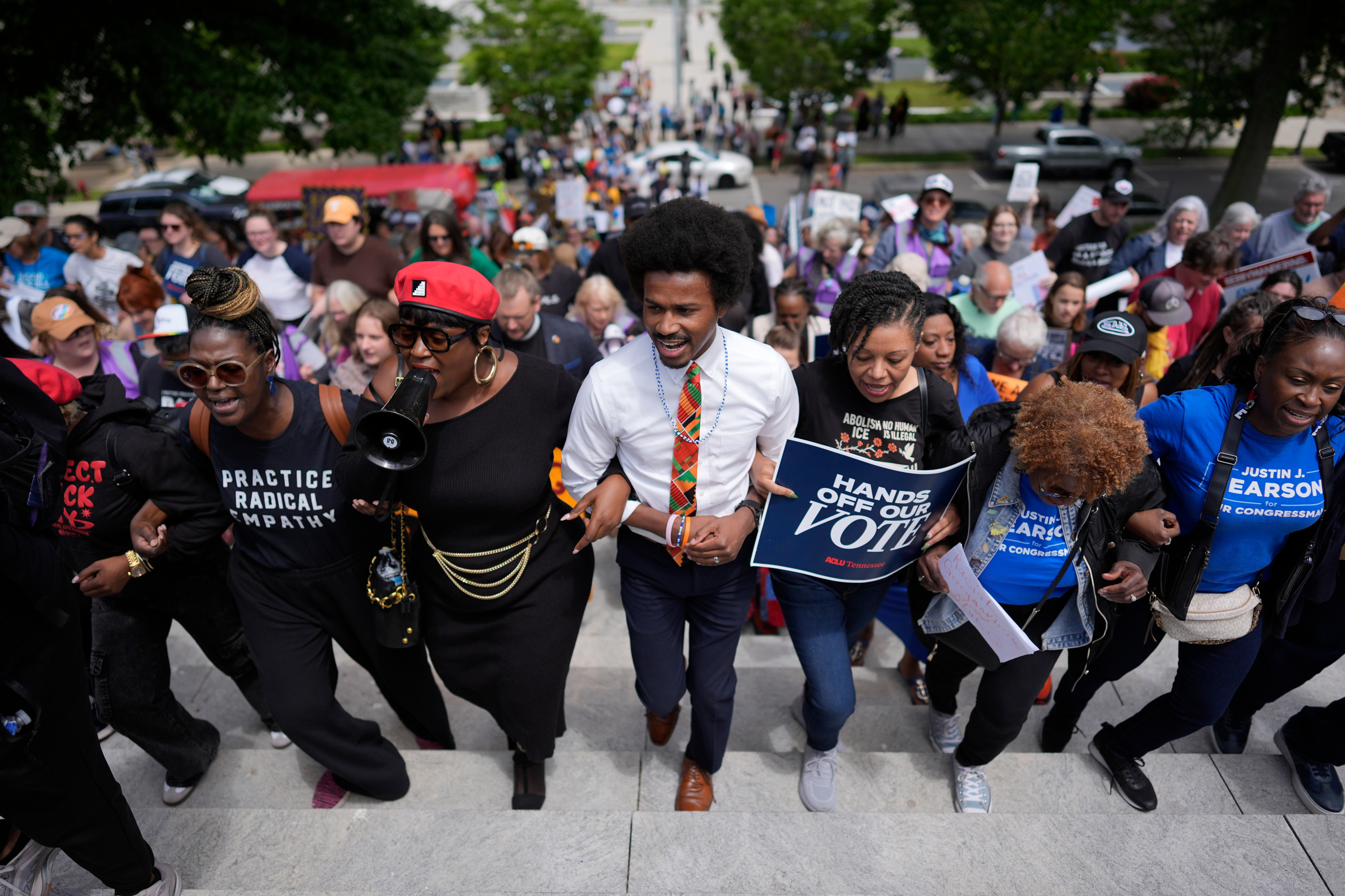 State Rep. Justin J. Pearson (D-Memphis), center, marches with protesters before a special session of the state Legislature to redraw U.S. congressional voting maps, in Nashville, Tennessee, on May 5, 2026. 