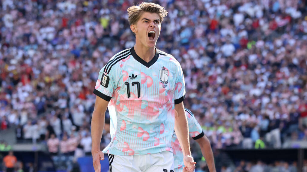 Charles De Ketelaere of Belgium celebrates after scoring his team's first goal.