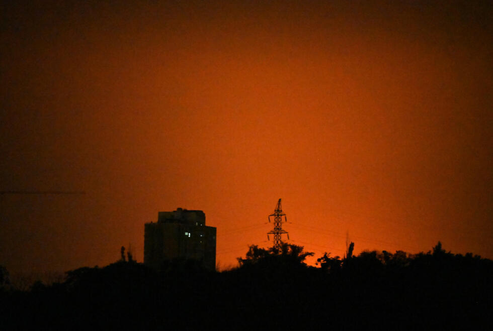 The sky over Kyiv glows during Russian missile strikes on the Ukrainian on July 19, 2026
