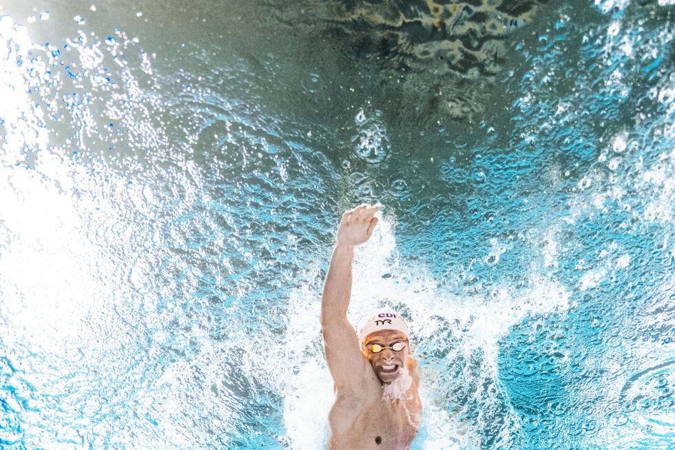 France's swimmer Leon Marchand competes in the men's 4x200m freestyle relay swimming final during the LEN European Aquatics Championships at the Olympic Aquatic Centre in Saint-Denis.