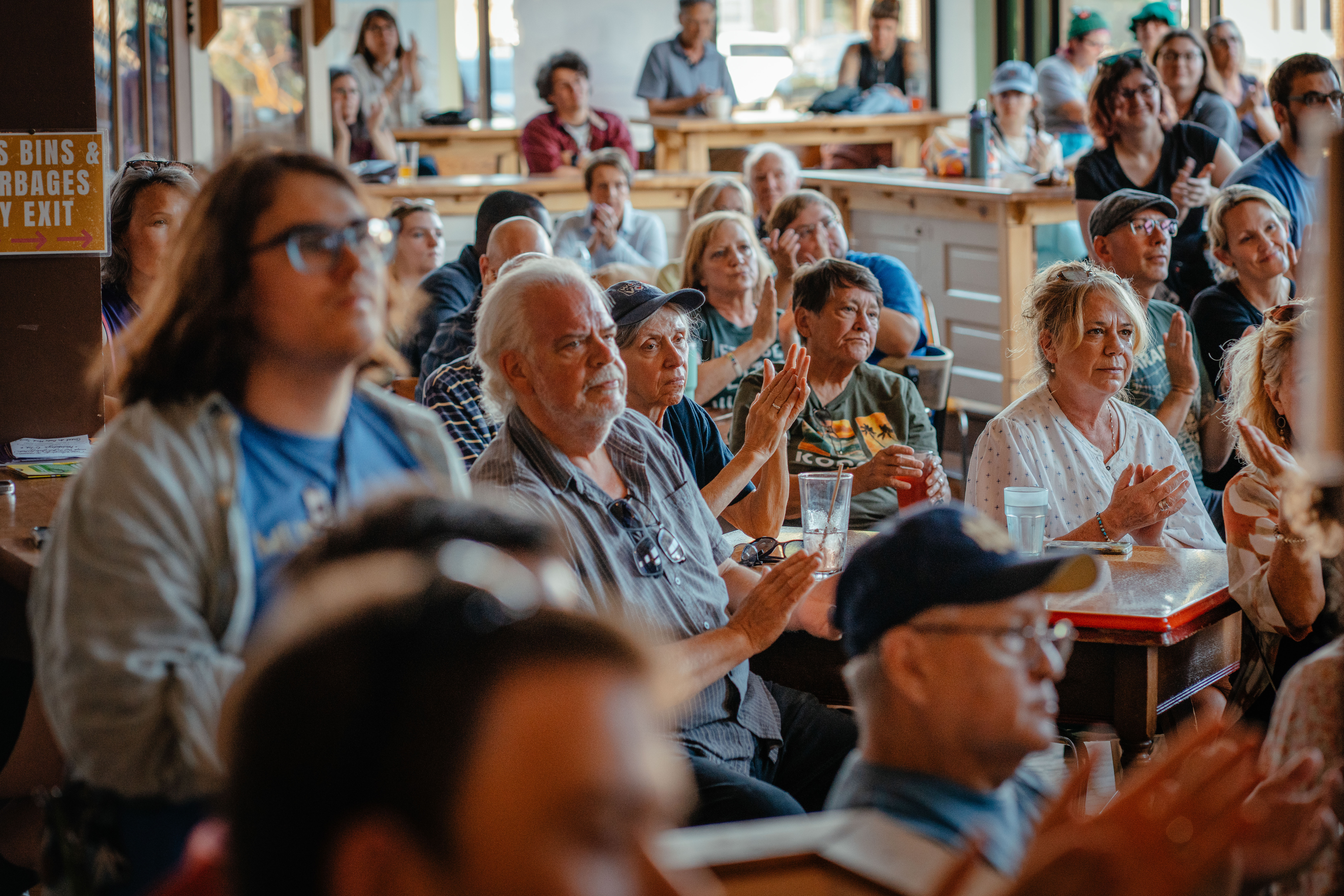 People fill Paradigm Coffee and Music and listen to Wisconsin Democratic candidate for governor Francesca Hong speak in Sheboygan, Wisconsin, on Aug. 8, 2026.