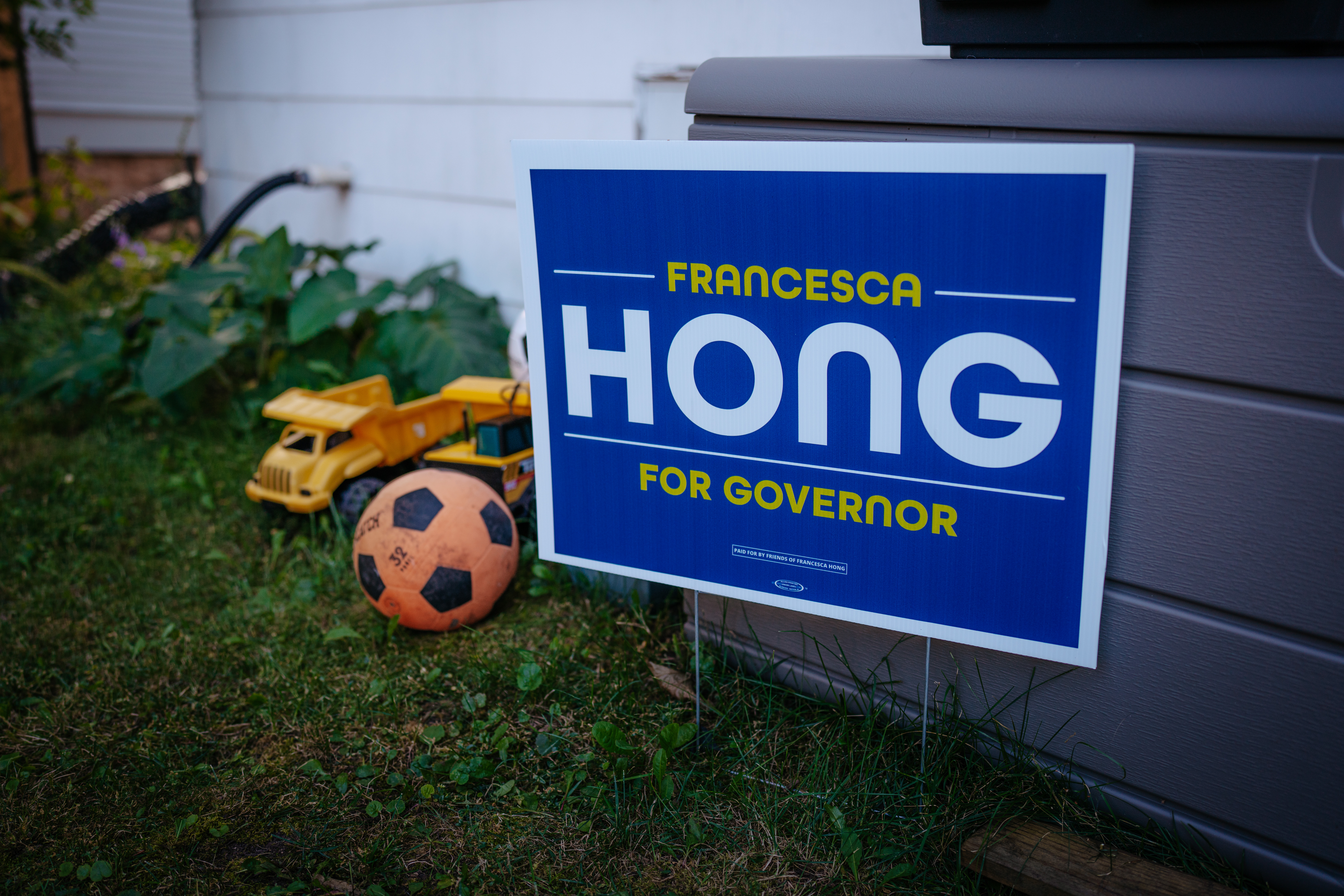 A sign supporting Democratic gubernatorial candidate Francesca Hong is displayed in a yard in Oshkosh, Wisconsin, on Aug. 8, 2026.