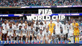 The England national team players pose with the medals confirming their third-place finish at the 2026 World Cup