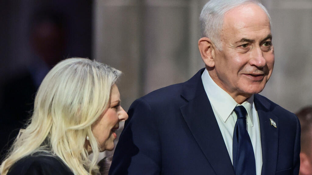 Israeli Prime Minister Benjamin Netanyahu with his wife Sara on the day of the funeral service for late U.S. Senator Lindsey Graham (R-SC) at Washington National Cathedral in Washington, D.C., U.S., July 28, 2026. REUTERS/Evelyn Hockstein