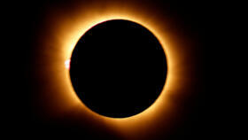 The moon completely covers the sun during a total solar eclipse, as seen from Spain on August 12, 2026.