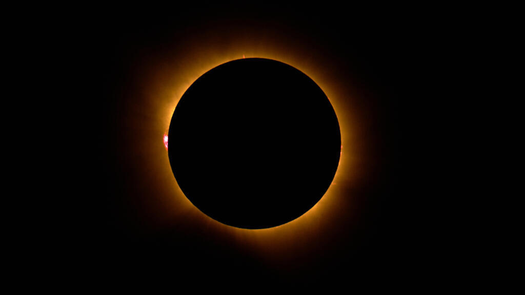 The moon covers the sun during a total solar eclipse in Palencia, Spain